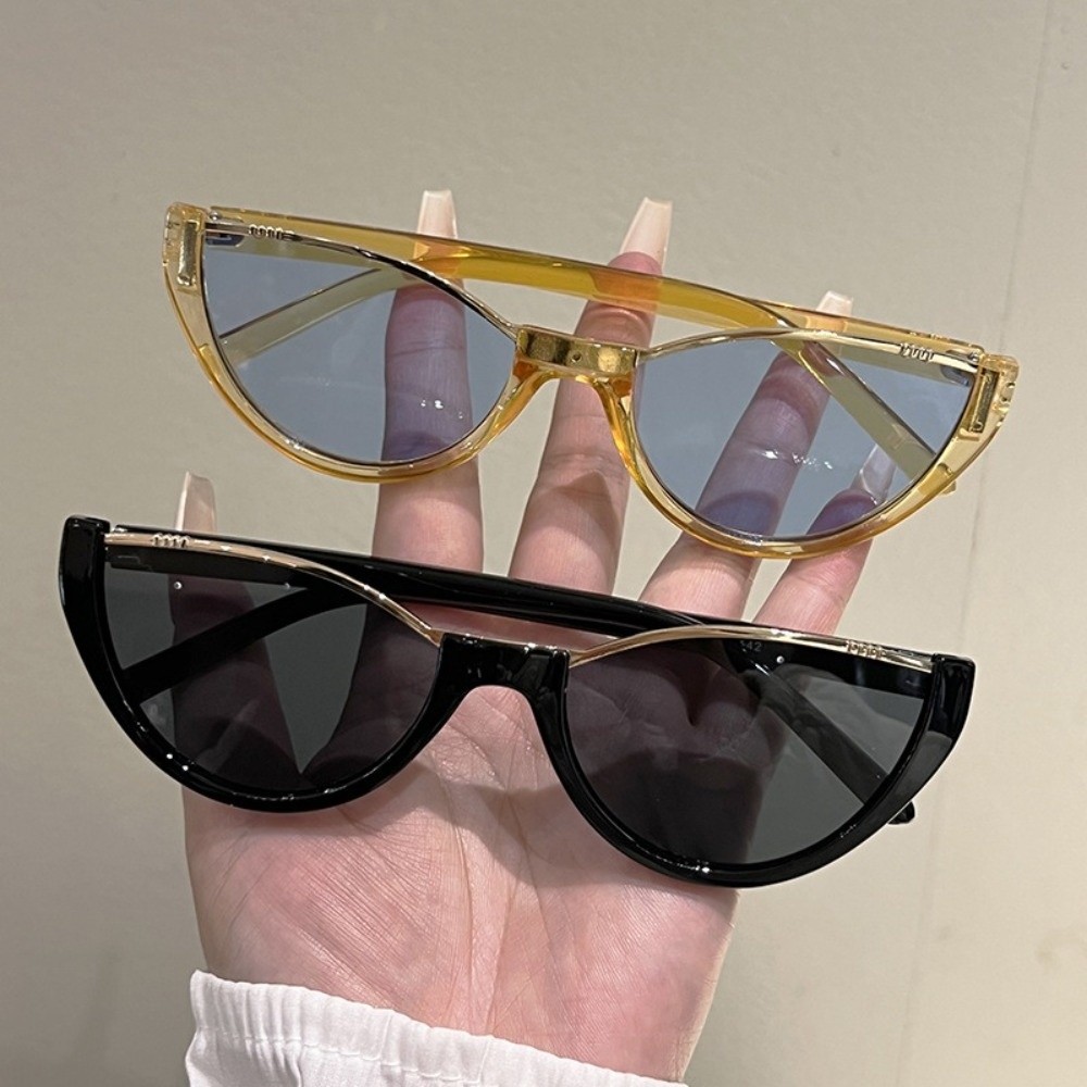 Street Fashion Photography - Lunettes de soleil œil de chat