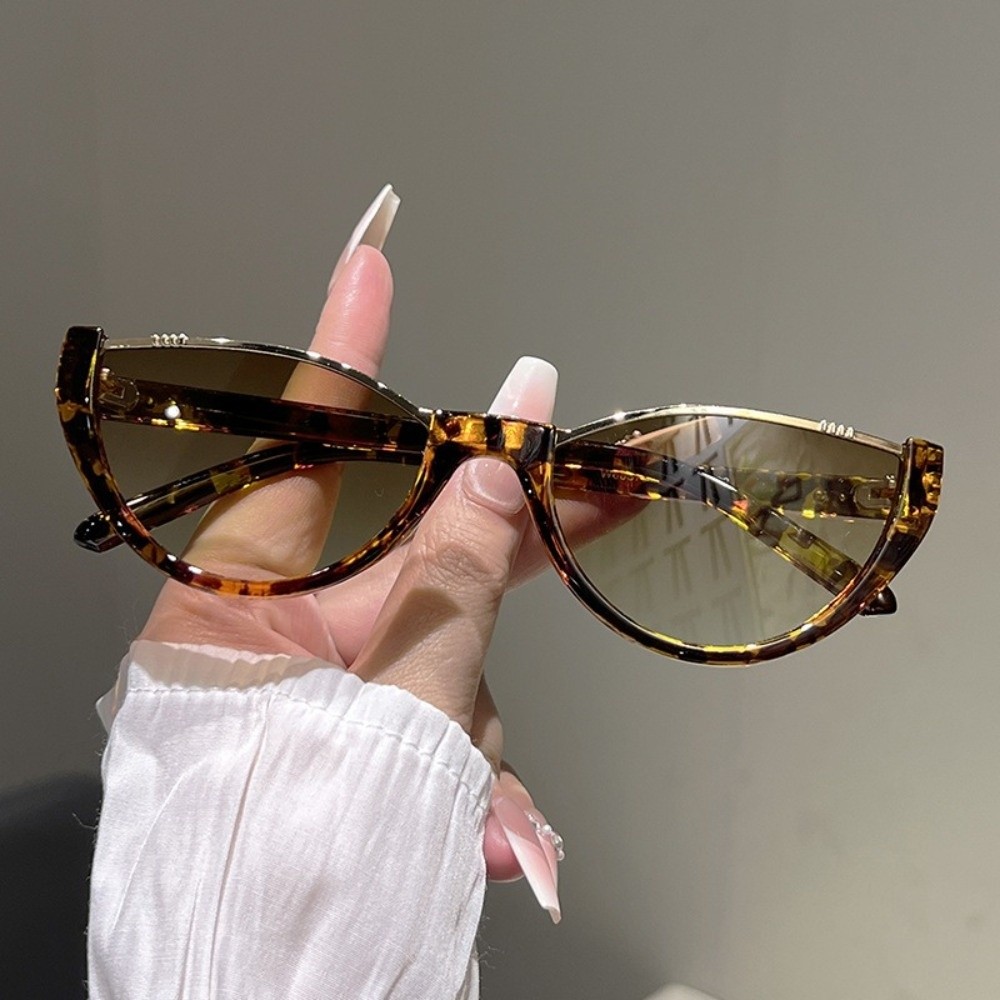 Lunettes de soleil œil de chat - Street Fashion Photography avis et prix